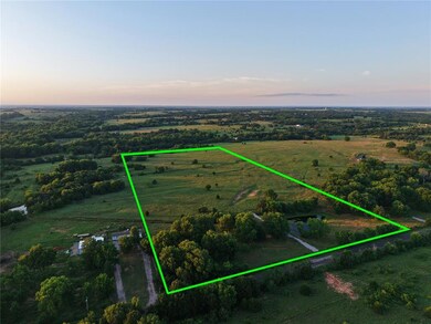 Aerial view at dusk of a view of countryside and property boundaries highlighted