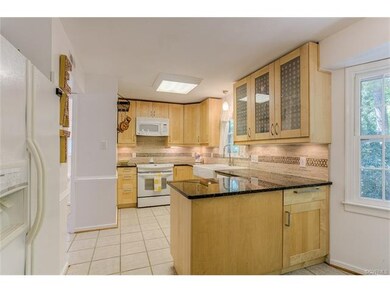 Updated kitchen-replaced cabinets, installed grani