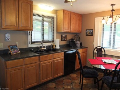 Eat in kitchen with plenty of cabinet space.