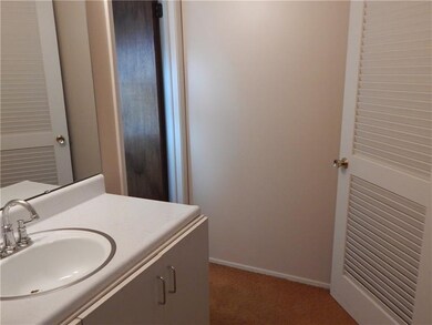 MASTER BEDROOM BATHROOM AREAWITH WALK IN CLOSET.
