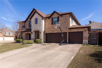 This home is nestled on an oversized lot with beau
