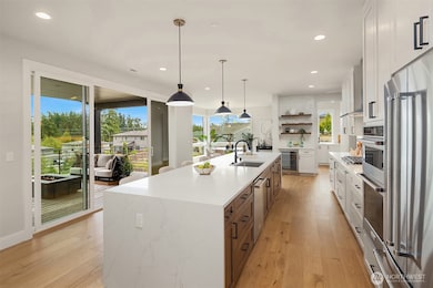 14 foot kitchen Island with 3cm slab quartz waterfall ends