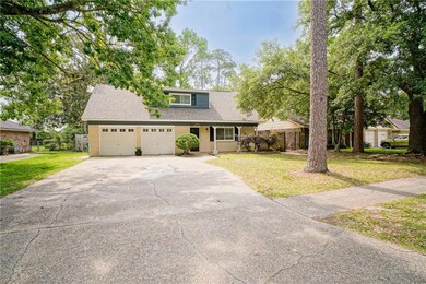 Two car garage, plus a long driveway.  Neighborhoo