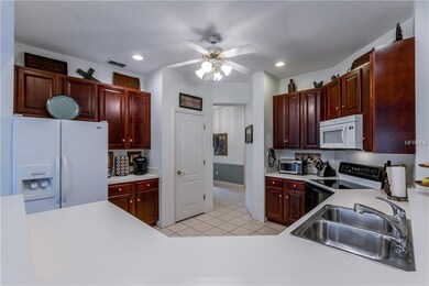 view of kitchen from breakfast bar