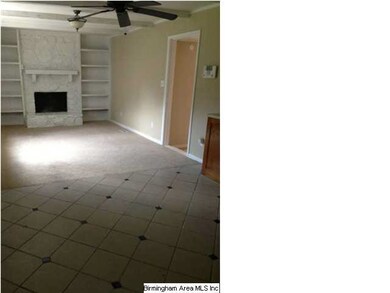 Den with fireplace
