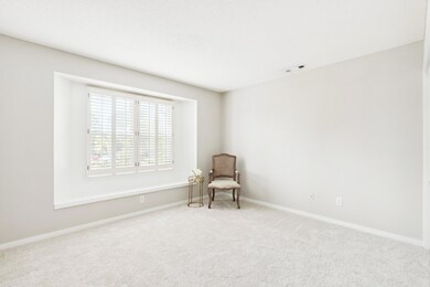 First-floor BR w/plantation shutters.