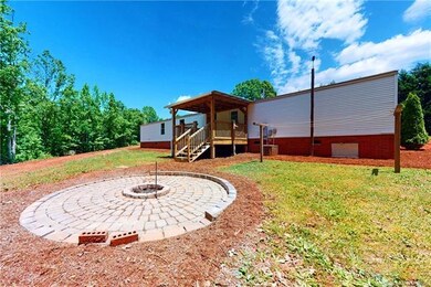 This Rocking chair front porch is one of 2 porches. The home has just been freshly pressure washed.