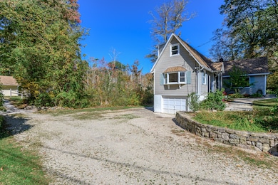 TWO HOUSES! Perfectly situated to have individual parking spaces and private yard space for each house