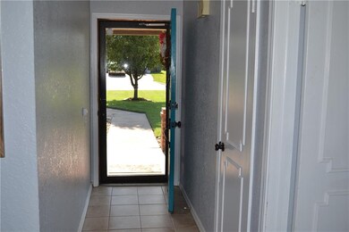 Foyer with coat closet.