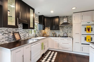 Plenty of cabinets / cupboards Gas range and wall double ovens