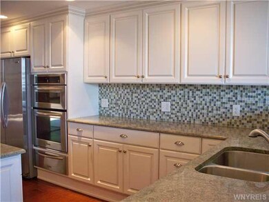Kitchen. granite counters, glass tile backsplash a