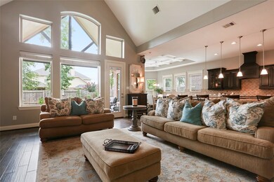 Gleaming wood floors and enough comfortable space for the whole family.