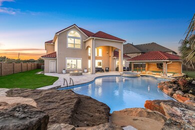 Outdoor oasis w/pool, spa, & sunken outdoor kitchen