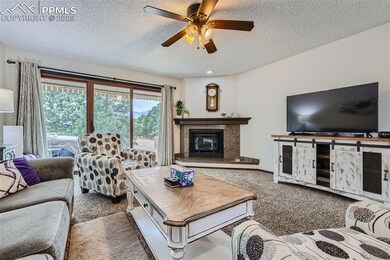 Sliding glass doors out to wood deck with electric