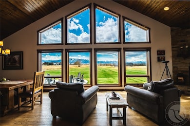 Enjoy the fireplace in the living room while looki