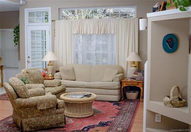 Living/Family room is open to dining and kitchen a