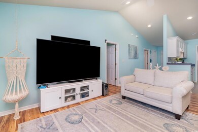 Living room featuring recessed lighting, baseboard