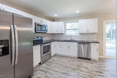 6803 Tango Ln N, Jacksonville, FL 32210 - photo 5