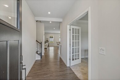 Once you step into the foyer, the home office is to your right. The glass French doors add so much light and so much privacy too.