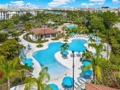 2nd Pool with poolside bar. Relax and soak up the sun at this sparkling blue pool under a beautiful blue sky.