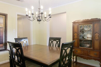 DINING ROOM TO KITCHEN AND FOYER