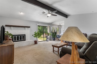 Spacious living room with gas fireplace.