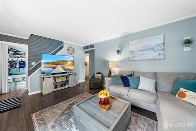 LVING ROOM WITH VIEW OF 4TH BED