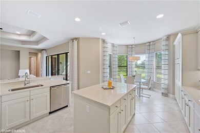Kitchen features include quartz counters, center i