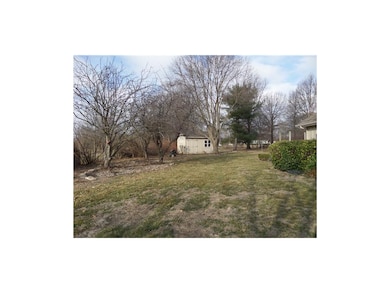 Large fenced 1 acre lot with workshop & extra stor