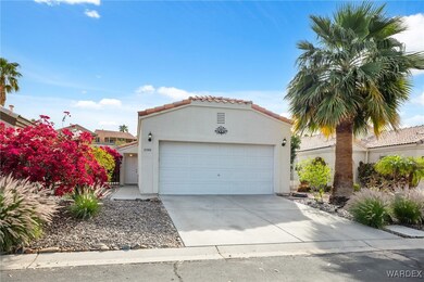 Mediterranean / spanish home with stucco siding, a