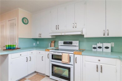 This kitchen has tons of cupboard storage and coun