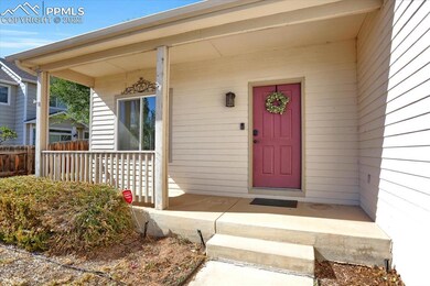 DON'T YOU JUST LOVE THIS INVITING FRONT PORCH.