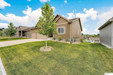 Premium lot and this house has tons of upgrades to include an upgraded appliance package for fridge and stove, insulated and painted garage, premium LVP on much of main floor, and Quartz counter tops in kitchen and all bathrooms.