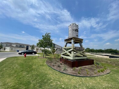 View of green lawn featuring a residential view