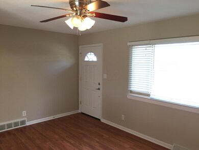 Family featuring laminate floors