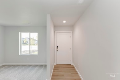 Entryway featuring recessed lighting and light wood-style floors