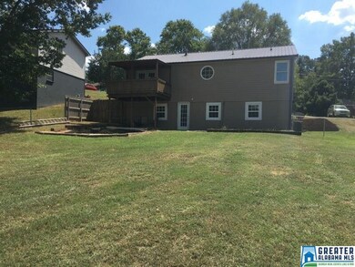HUGE BACKYARD! COVERED DECK OFF OF MASTER BEDROOM.