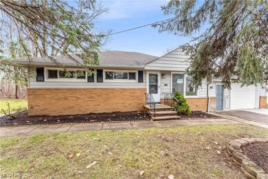 Ranch-style home featuring a garage