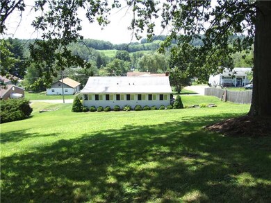 Exterior Back. WOODED REAR YARD LOOKING TO BACK EN