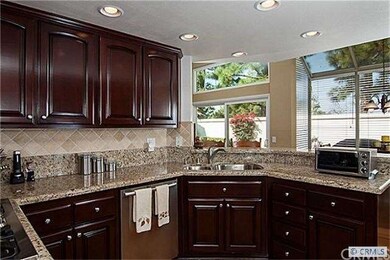 Recently remodeled kitchen with granite counters a