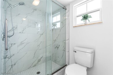 Primary Bathroom with glass shower enclosure