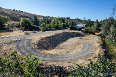 Just under one acre with sunny, level land and easy access year-round.