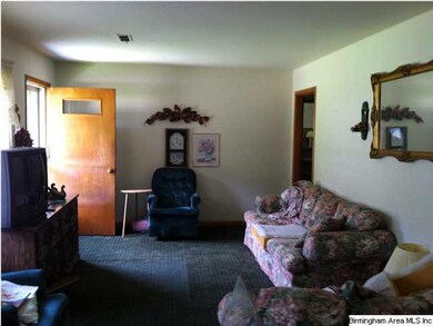 View from dining room through loving room.  Hardwo