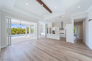 The open concept great room, kitchen, and dining a