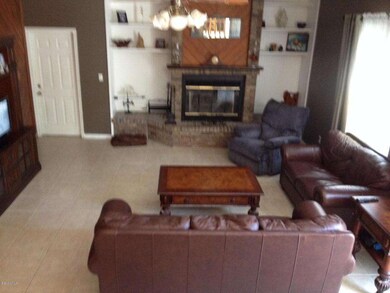 Familyroom with wood burning fireplace