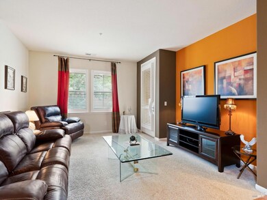 Living room showing door out to the balcony.