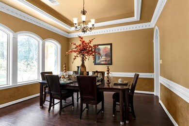 Elogant formal dining room to lert with hidden acc