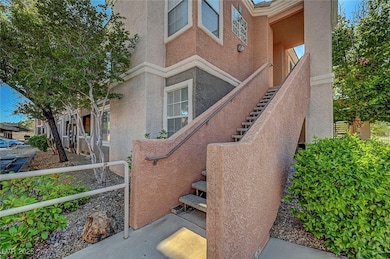 Property entrance featuring stucco siding