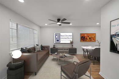 Living Room w/Wood Floors  & Picture Frame Window