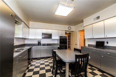 KITCHEN 14X13: All stainless cabinets makes for a 